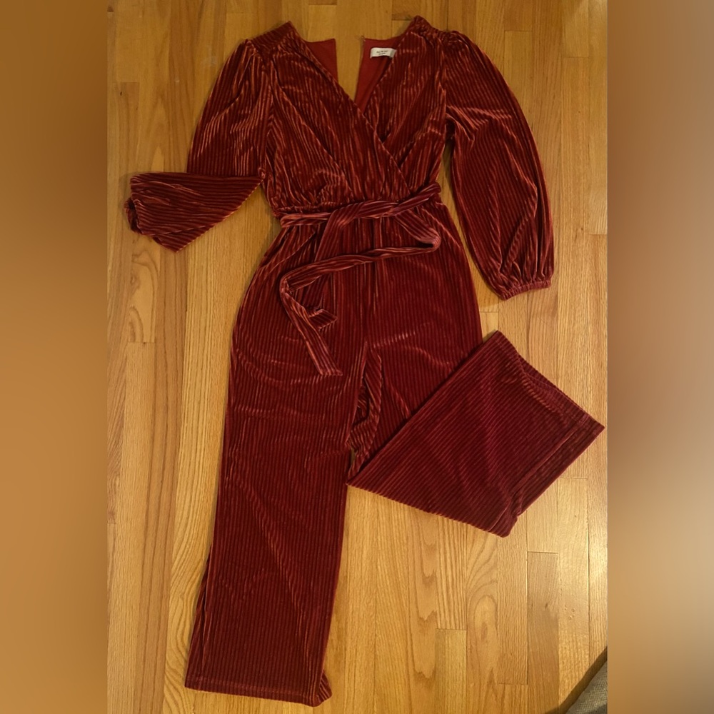 Anthropologie red jumpsuit